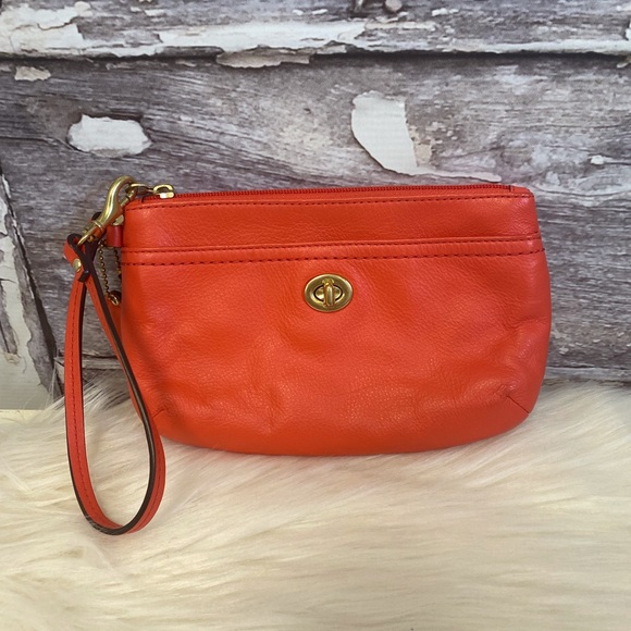 Coach Park Orange Leather Medium Turnlock Wristlet F49472 - Picture 1 of 8